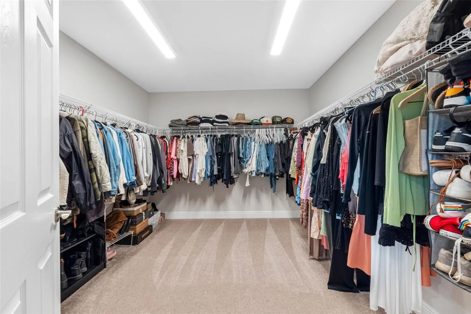 Oversized walk-in closet in the primary suite