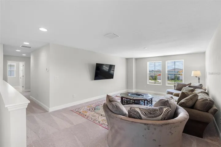 Spacious upstairs loft for a media room, playroom, or office