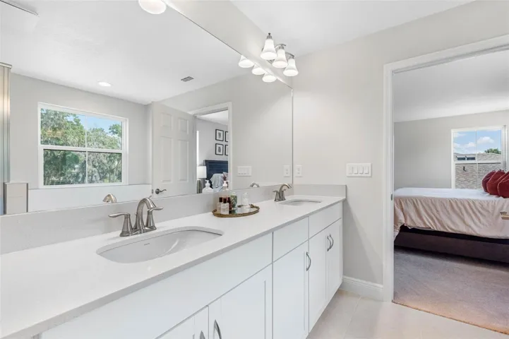 Primary bath with dual sinks and quartz countertops
