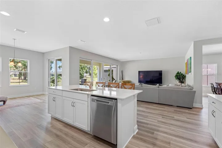 Large island with storage, opening to the cafe and backyard