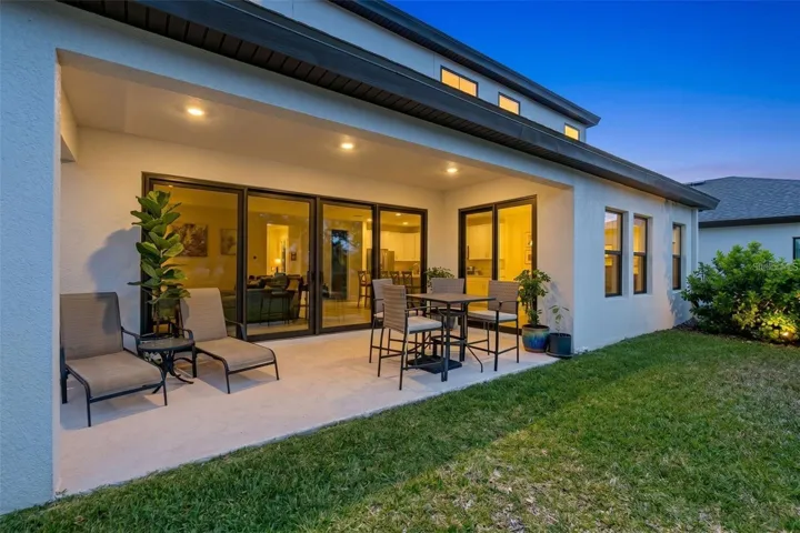 Covered lanai with recessed lighting and room to entertain and room for a pool!