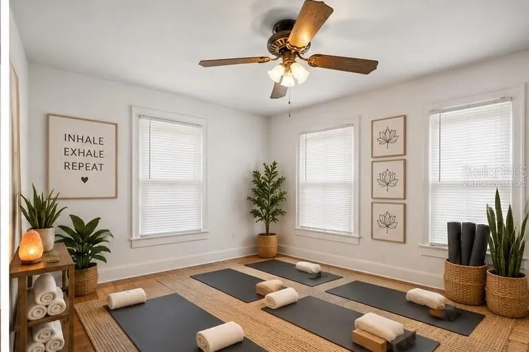 Upstairs bed 2 (virtually staged as a yoga session)