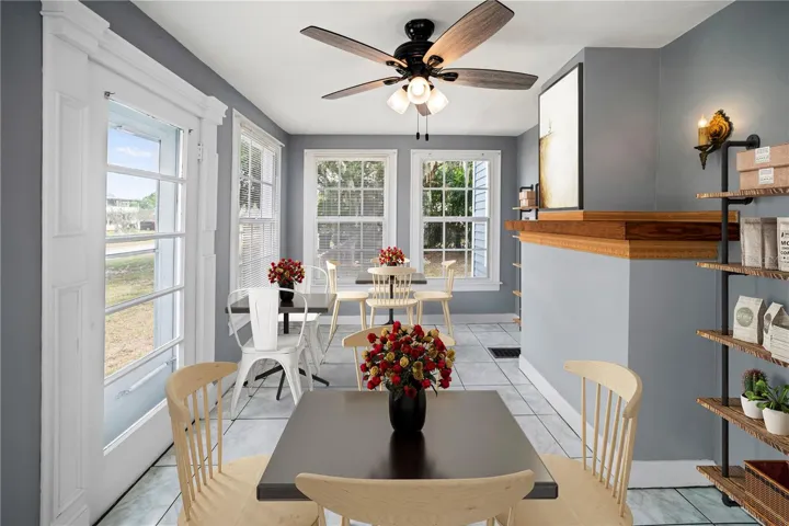 Foyer/Entrance (virtually staged for a cafe)