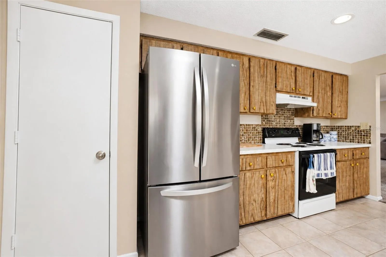 Kitchen has closet pantry
