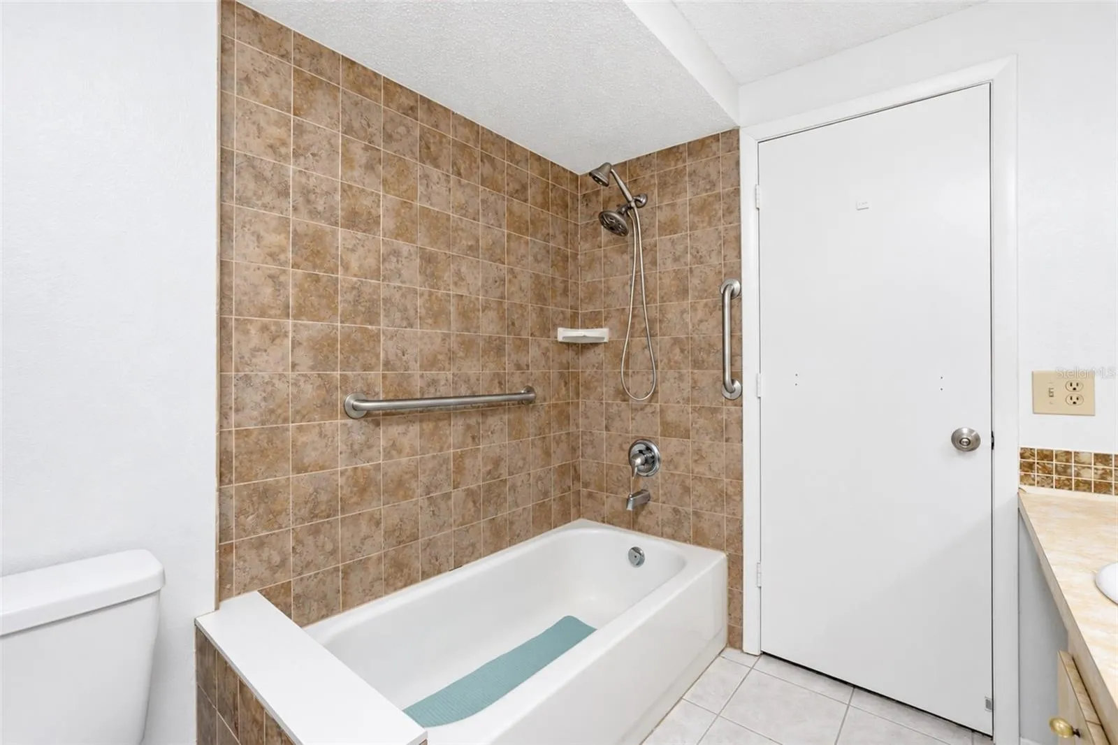 Primary bathroom with tub/shower combo