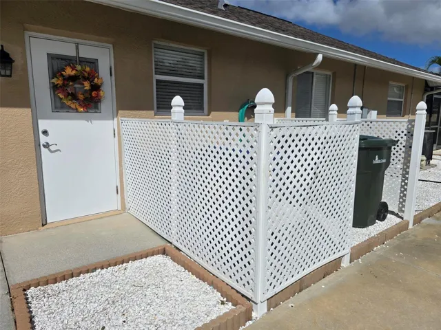 Dedicated area for cans, and side garage entry.
