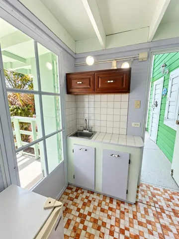 2nd Floor - Bedroom A small kitchen with balcony