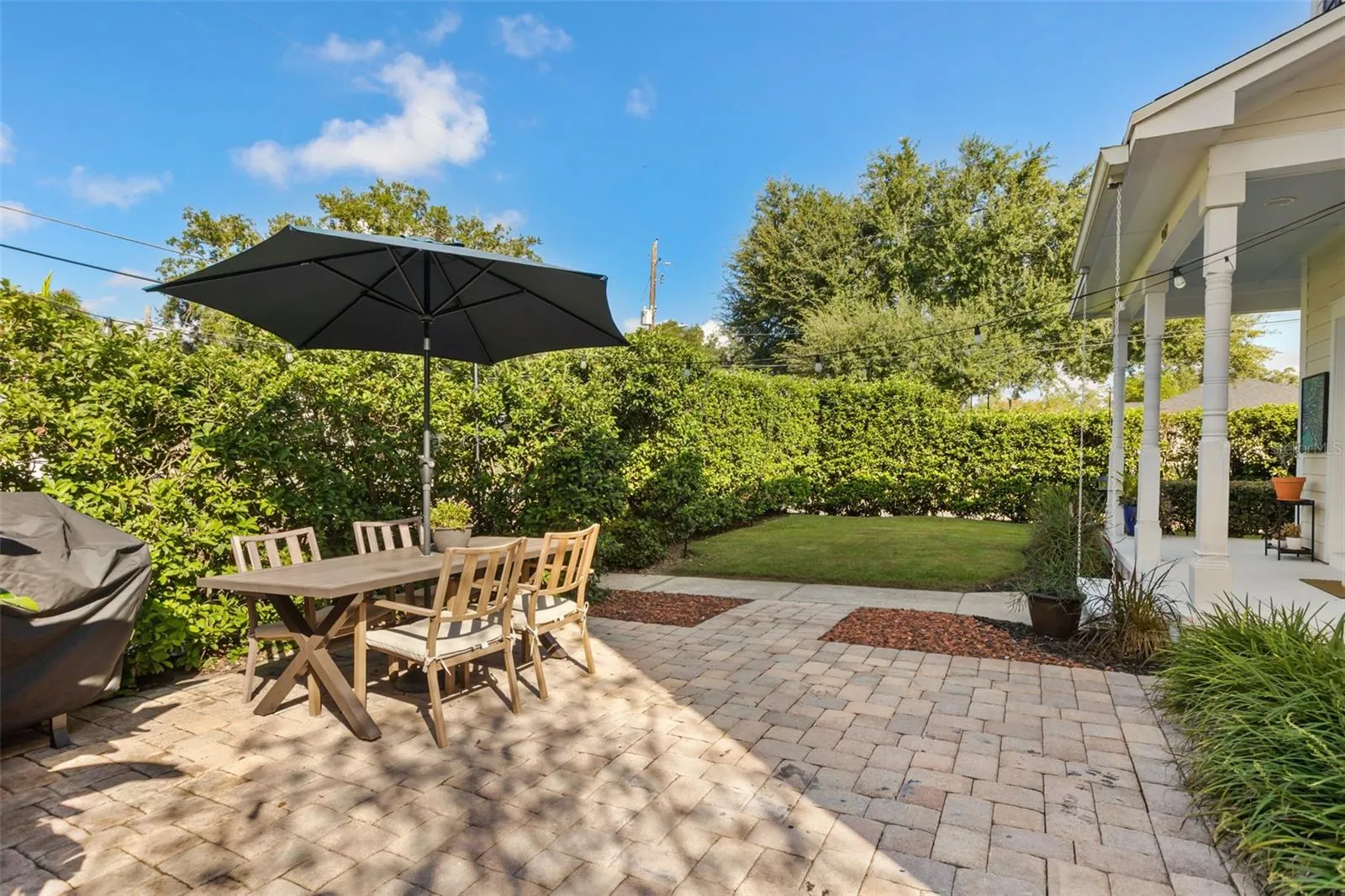 Incredible secluded  extended outdoor patio space perfect for all your relaxation and entertaining needs.