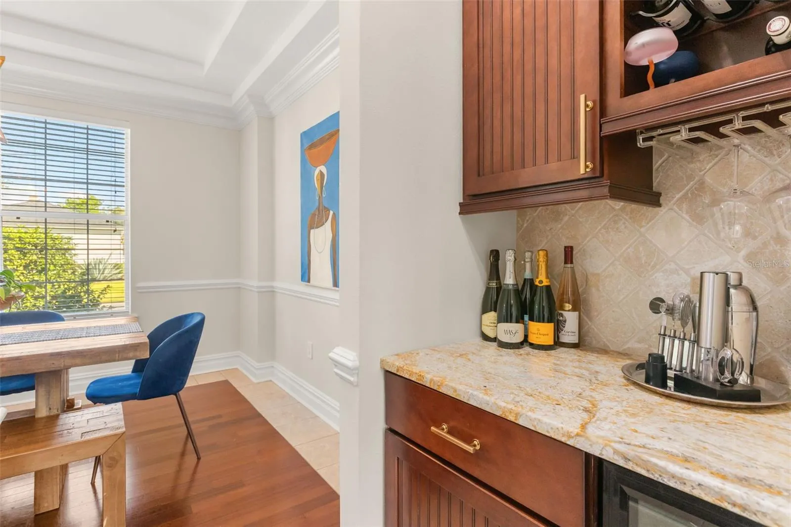 Beautiful coffee bar/drop zone accessible via dining room or upon entry from 2 car garage.