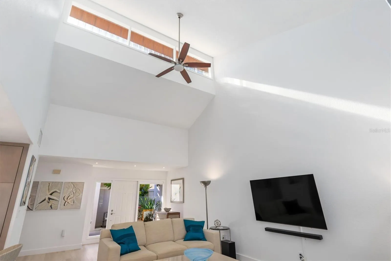 Notice soaring 17 foot ceiling