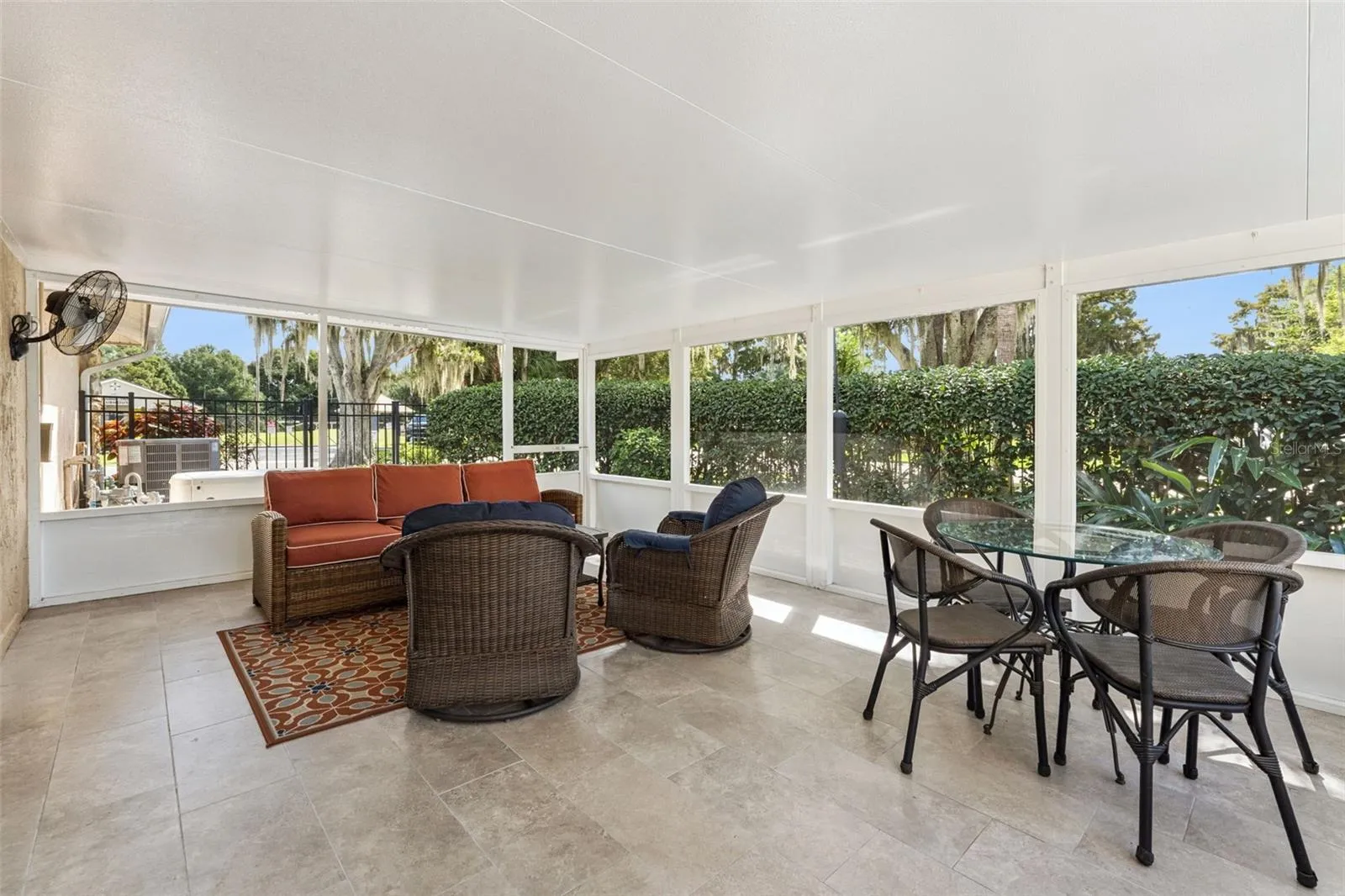Covered, screened-in lanai off kitchen area.