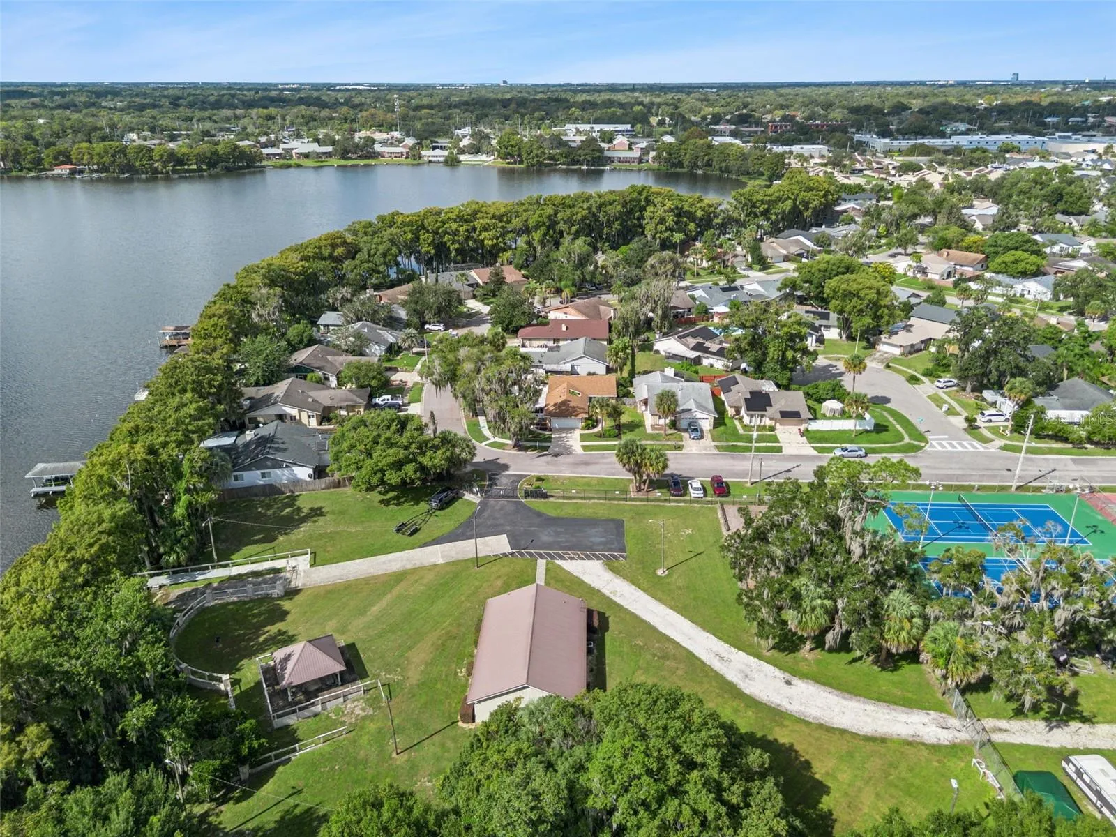 Clubhouse, pavilion, tennis courts and lake access is directly across the street!
