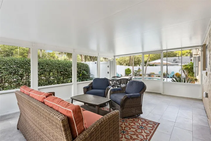 Overlooks and provides access to the pool area.