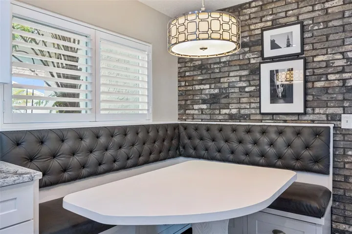 Custom built-in dining bench and table with storage.