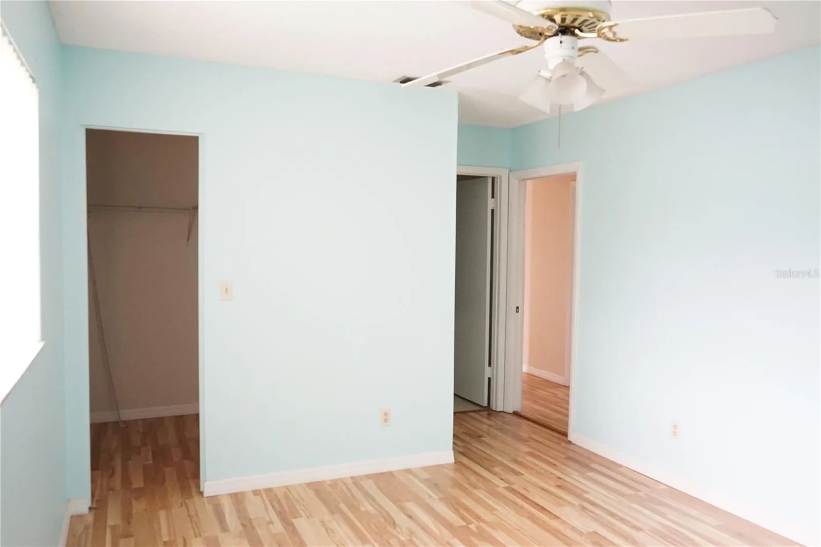 primary bedroom and walk in closet to the left
