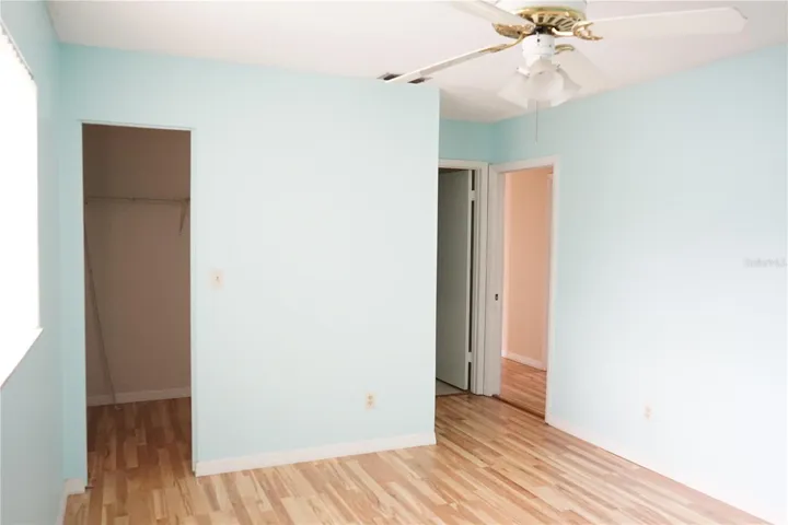 primary bedroom and walk in closet to the left