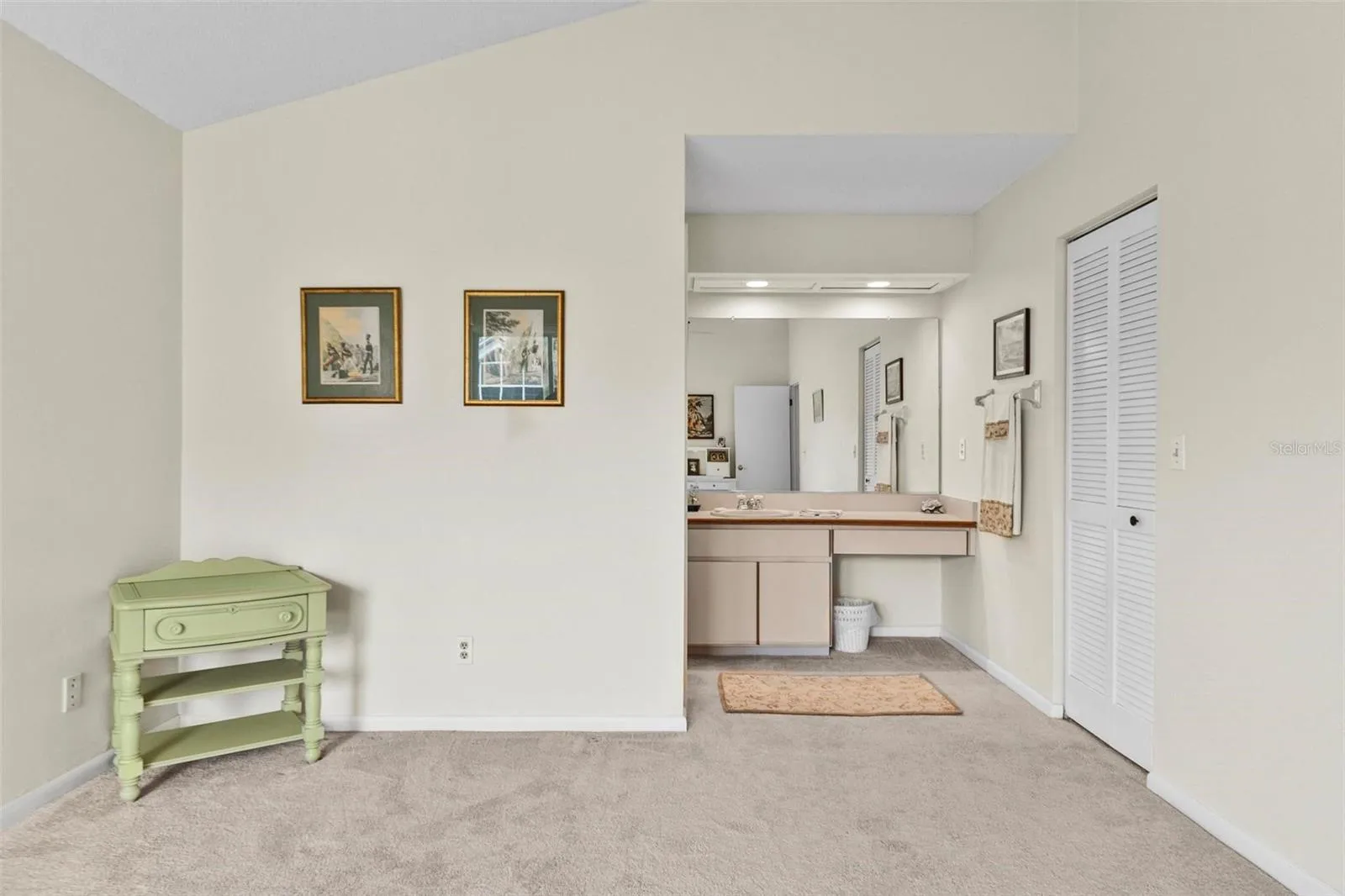 Owners suite separate sink from shower area