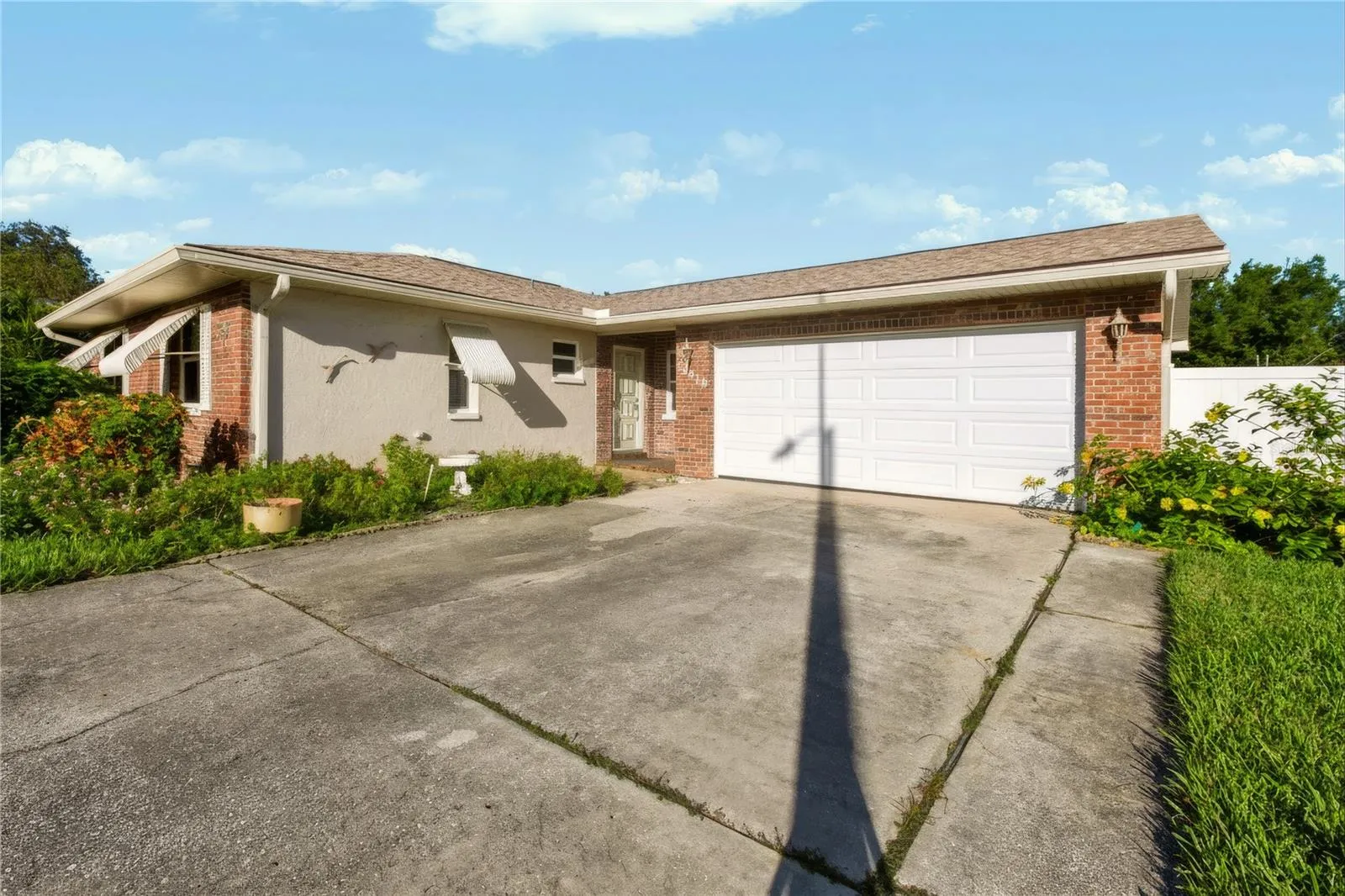 Front of the home with large driveway