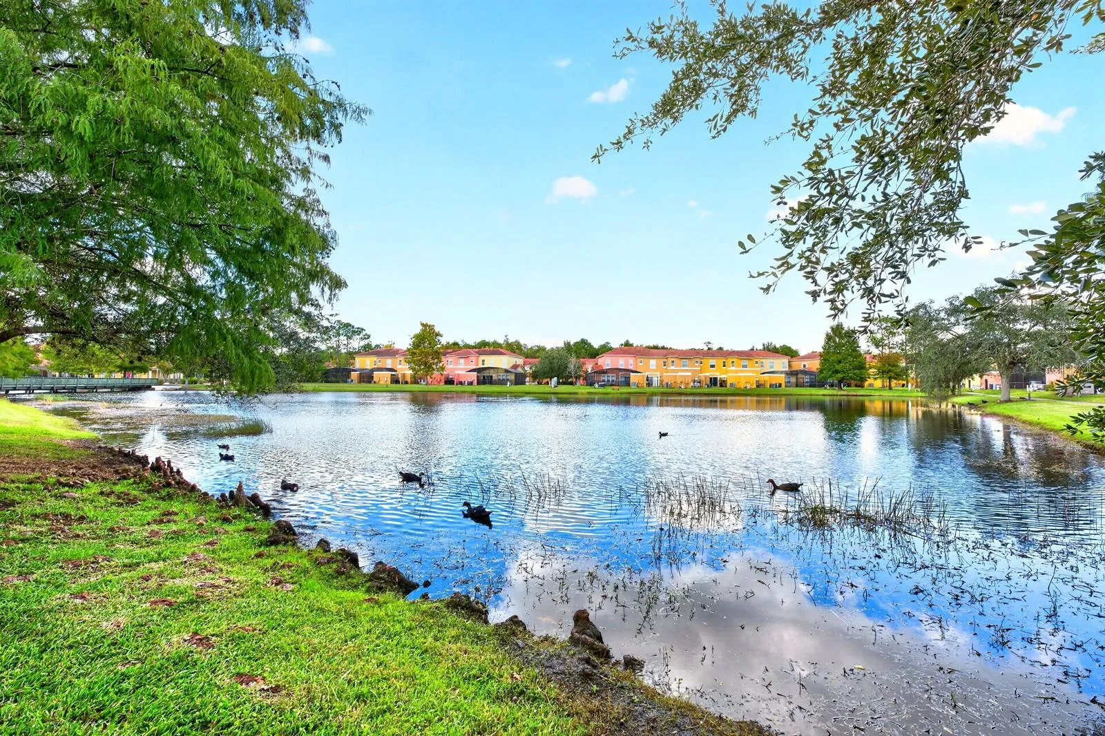 A PEACEFUL POND VIEW adds to the home's appeal.