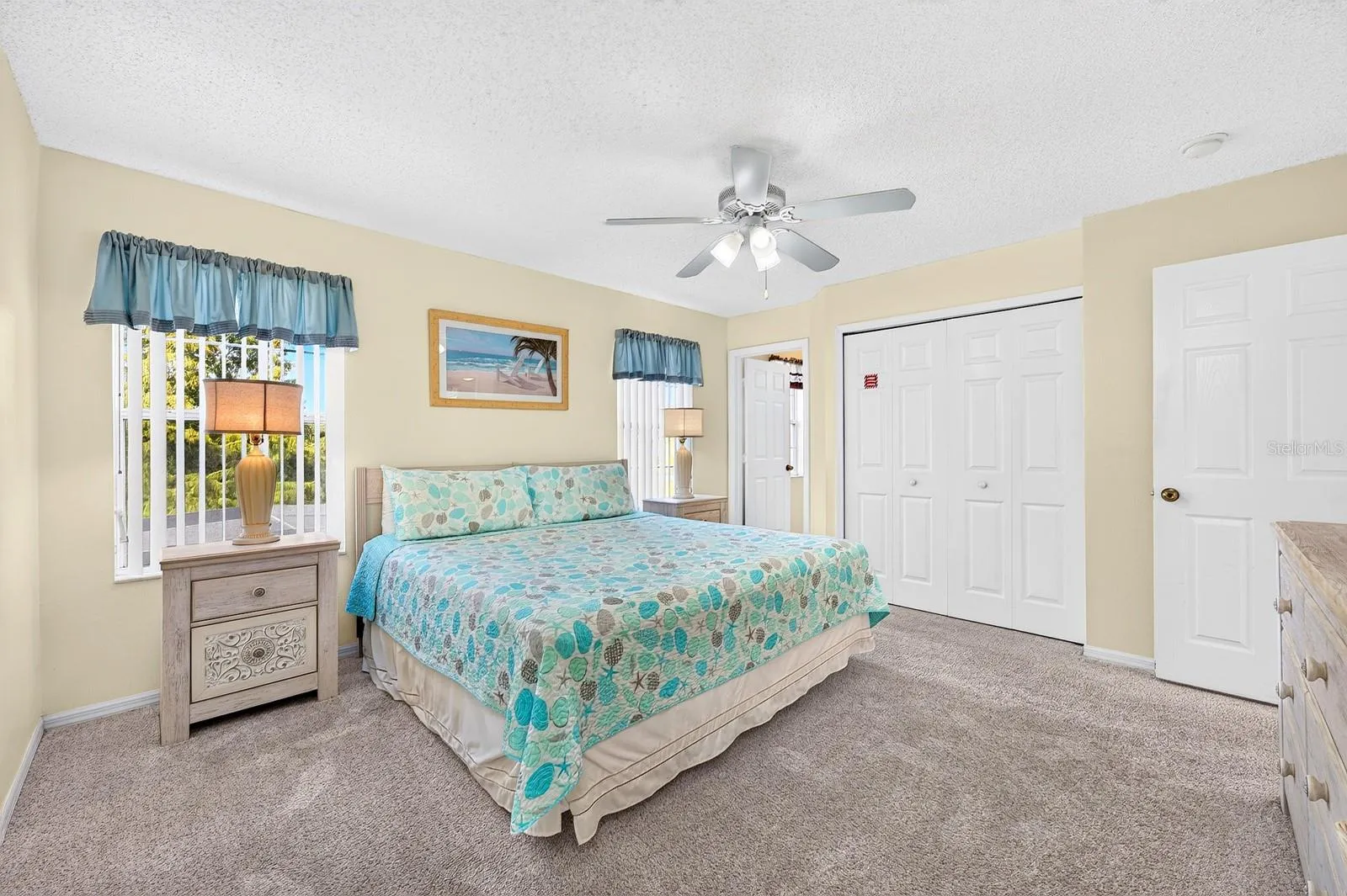 The spacious PRIMARY SUITE features a large built-in closet and a PRIVATE EN SUITE BATH.