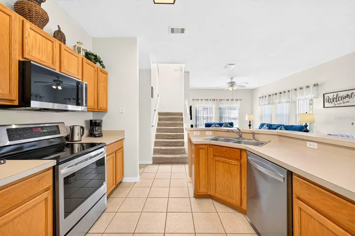 The Kitchen supplies ample cabinetry and counter space.