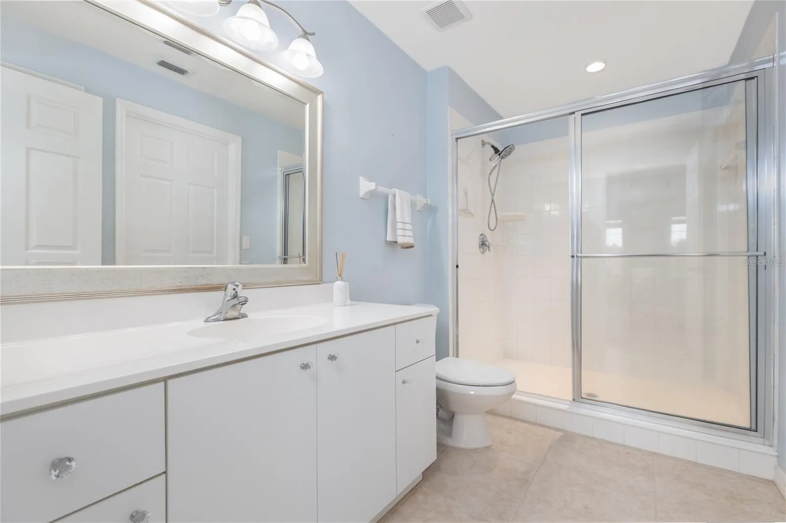 primary bath with walk in closet