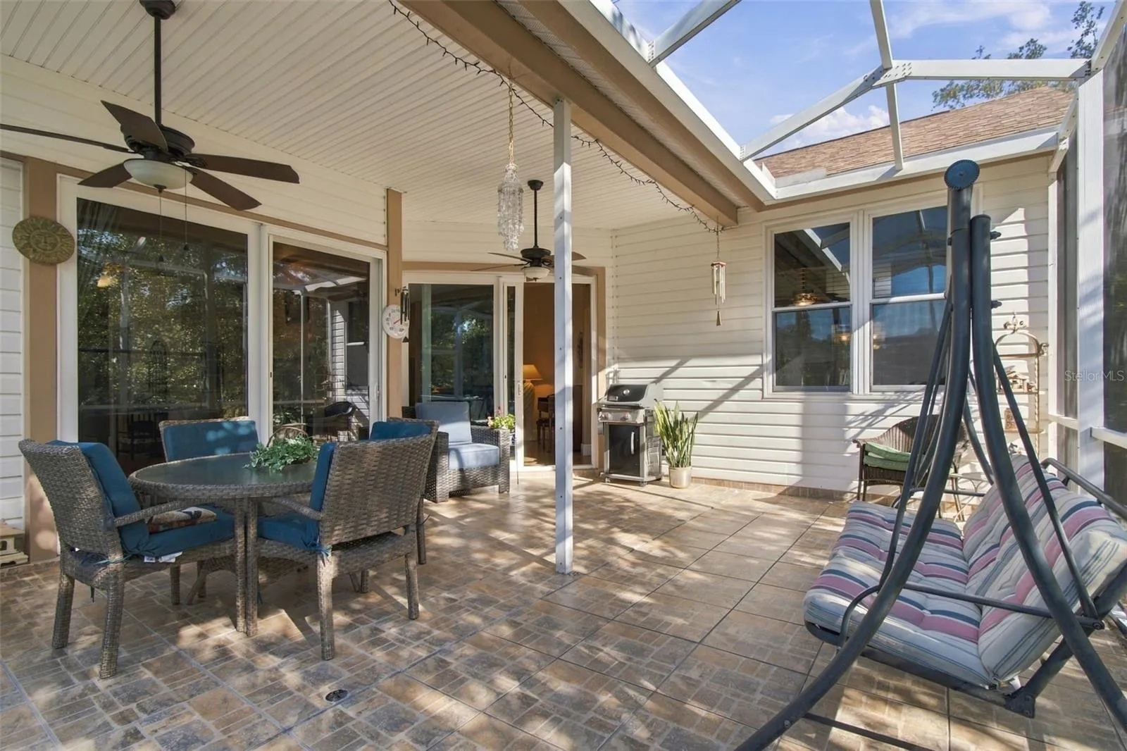 Screened and covered (+ uncovered) lanai off Family Room & Living Room