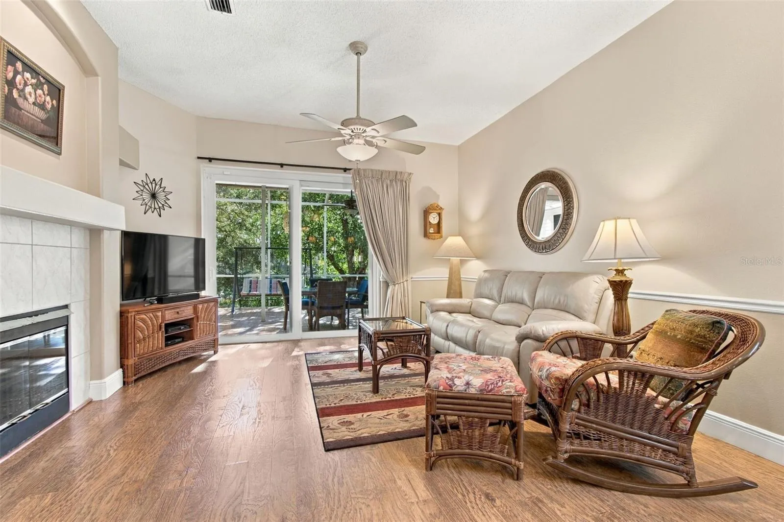 Open Family Room w/ fireplace & hurricane sliders to lanai - connected to open kitchen