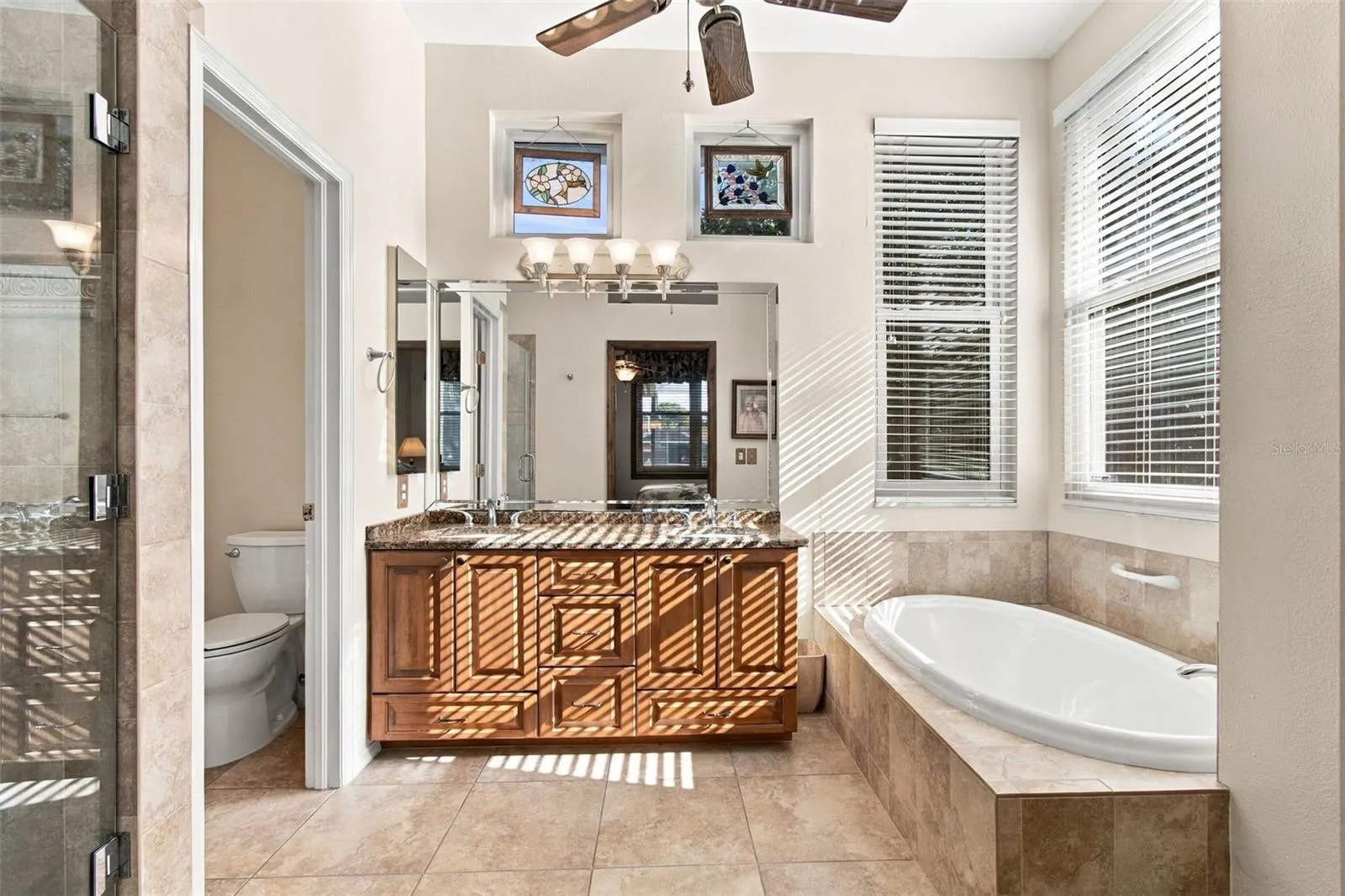 Updated Primary Bath with separate shower, garden tub & water closet