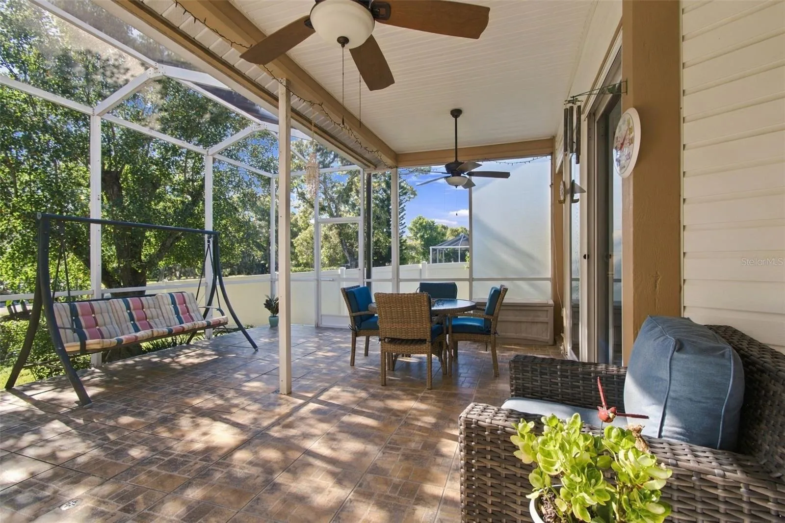 The lanai offers a peaceful retreat joining the indoor & outdoor spaces