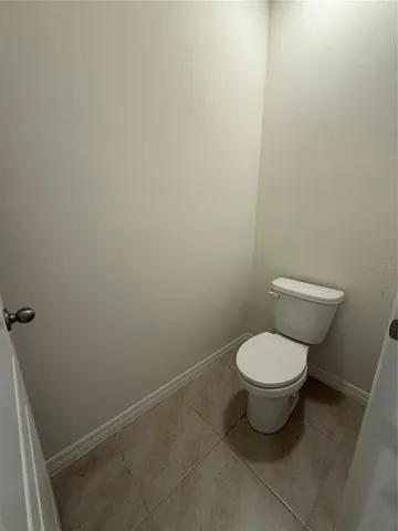 Toilet in primary bathroom