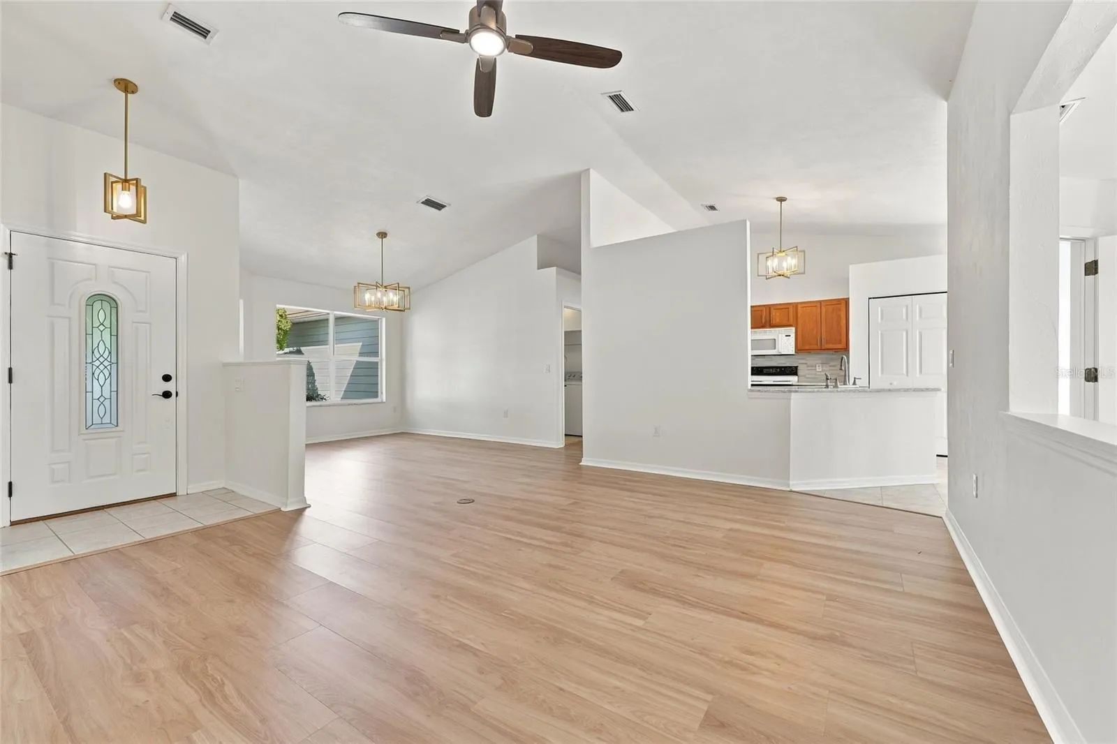 Family Room looking into Dining Room and Kitchen