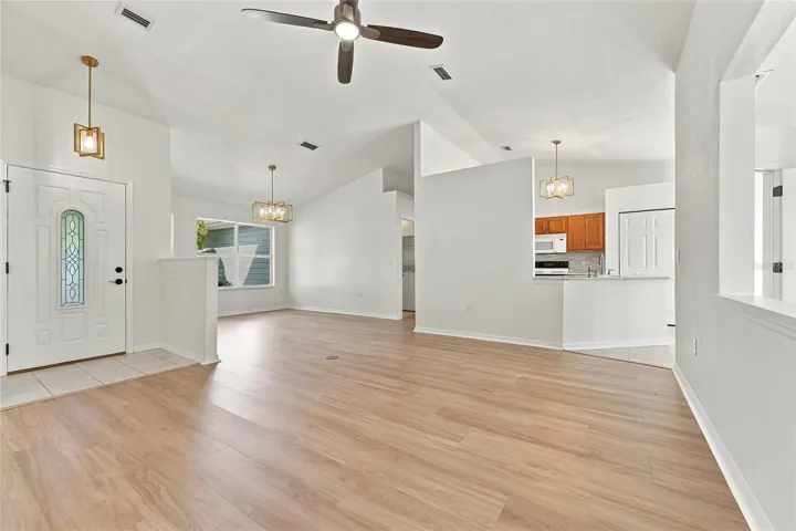 Family Room looking into Dining Room and Kitchen