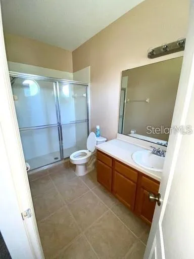 Master bath with separate toilet area