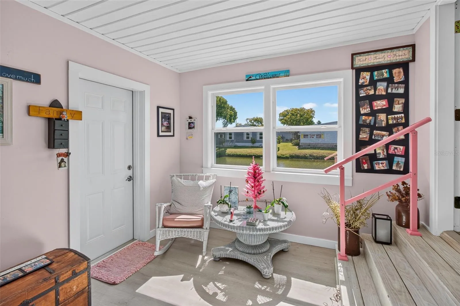 Exterior door to back yard, stairs to main level
