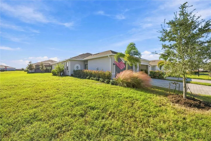 Huge corner lot with fence. HOA maintains the yard.