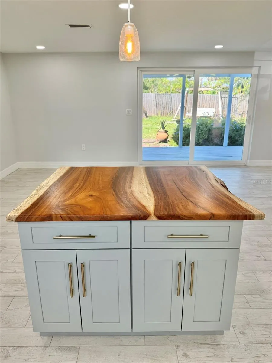 Custom Island with Locally made Live Edge Countertop