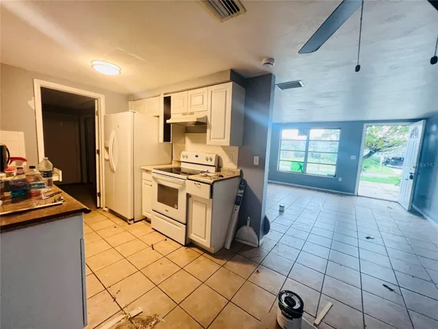 KITCHEN/LIVING ROOM VIEW FROM DINING AREA