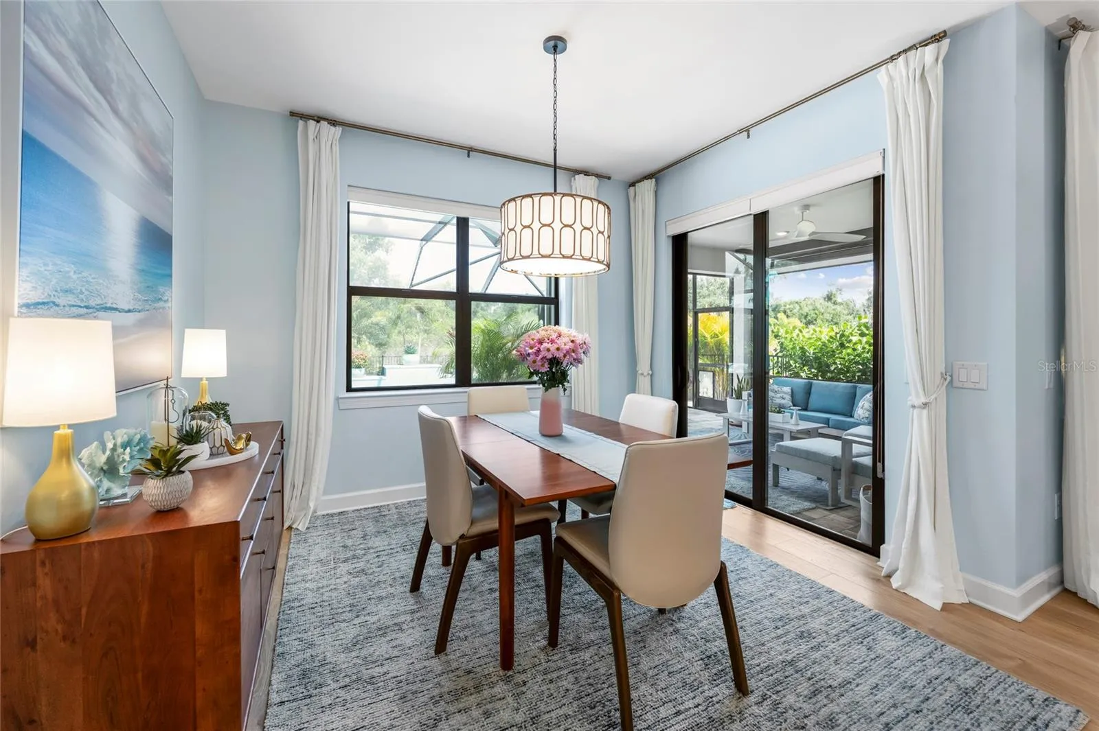 Dining room complete with chandelier and Pool access!