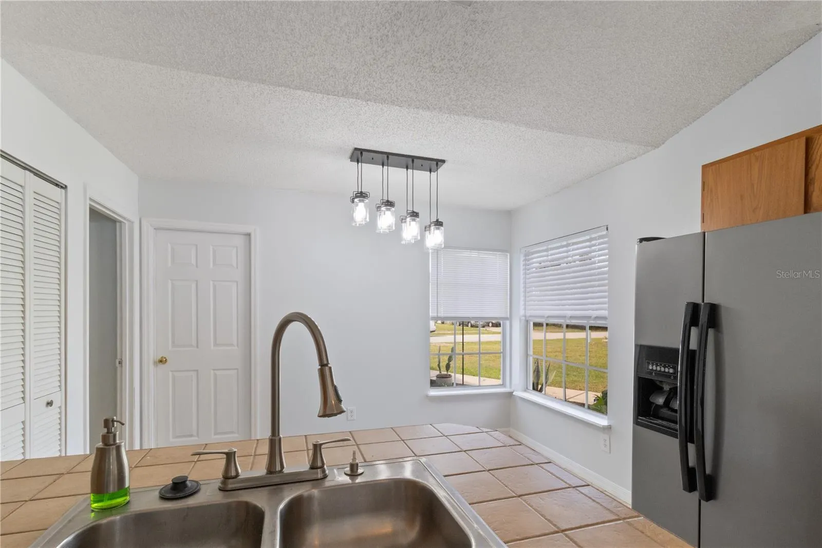 Kitchen looking into breakfast nook
