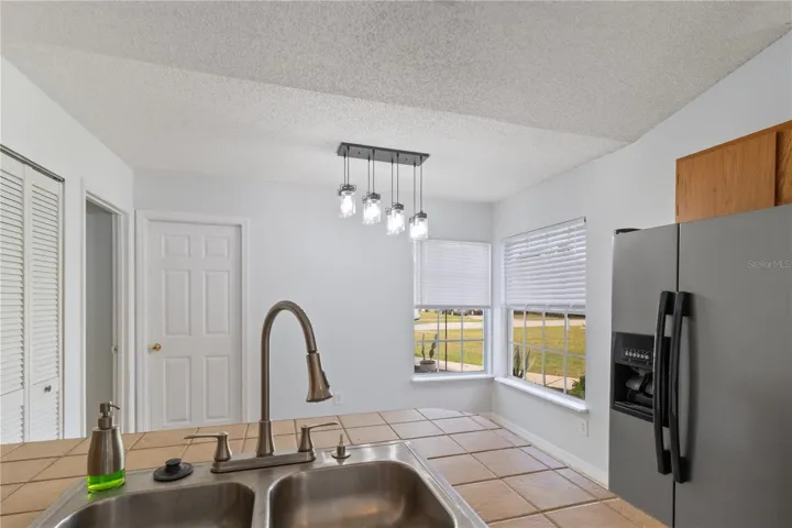 Kitchen looking into breakfast nook