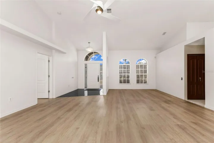 Living room looking at front door/foyer