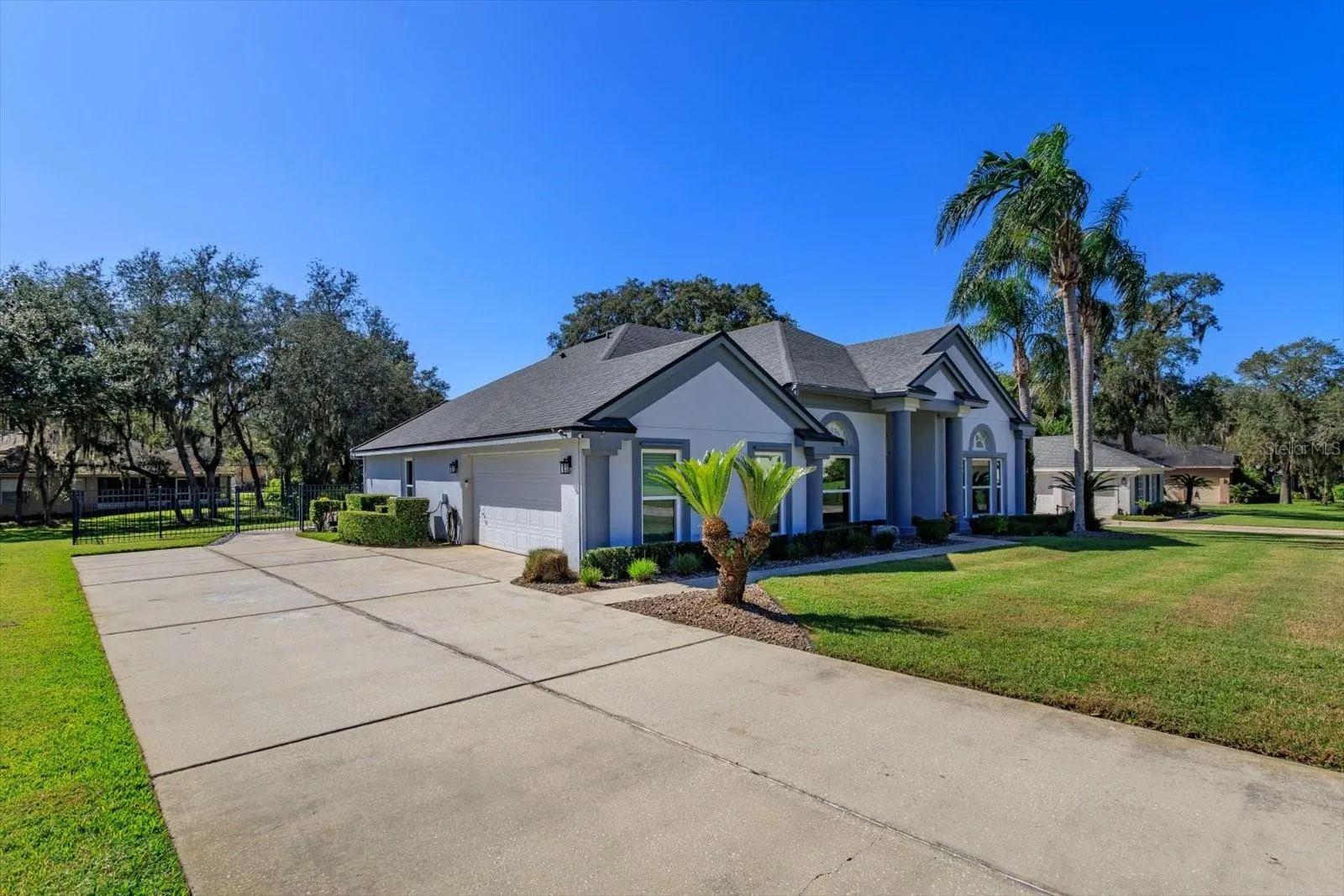 Side entry garage with long driveway for lots of extra parking