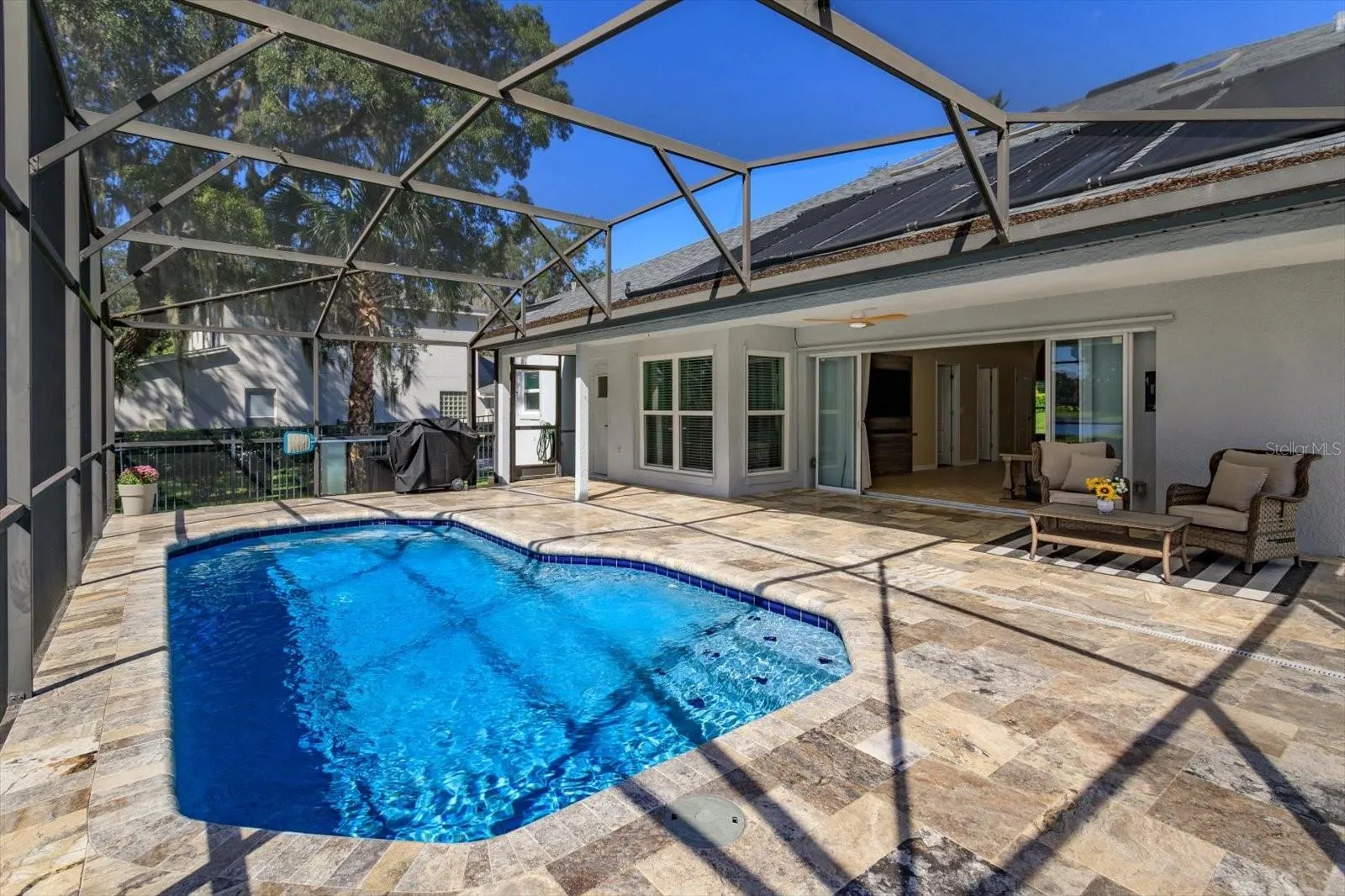 Header added to remove posts on porch for expansive open view