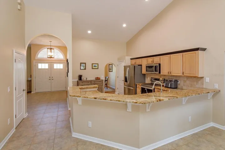 Expansive granite counters with backsplash