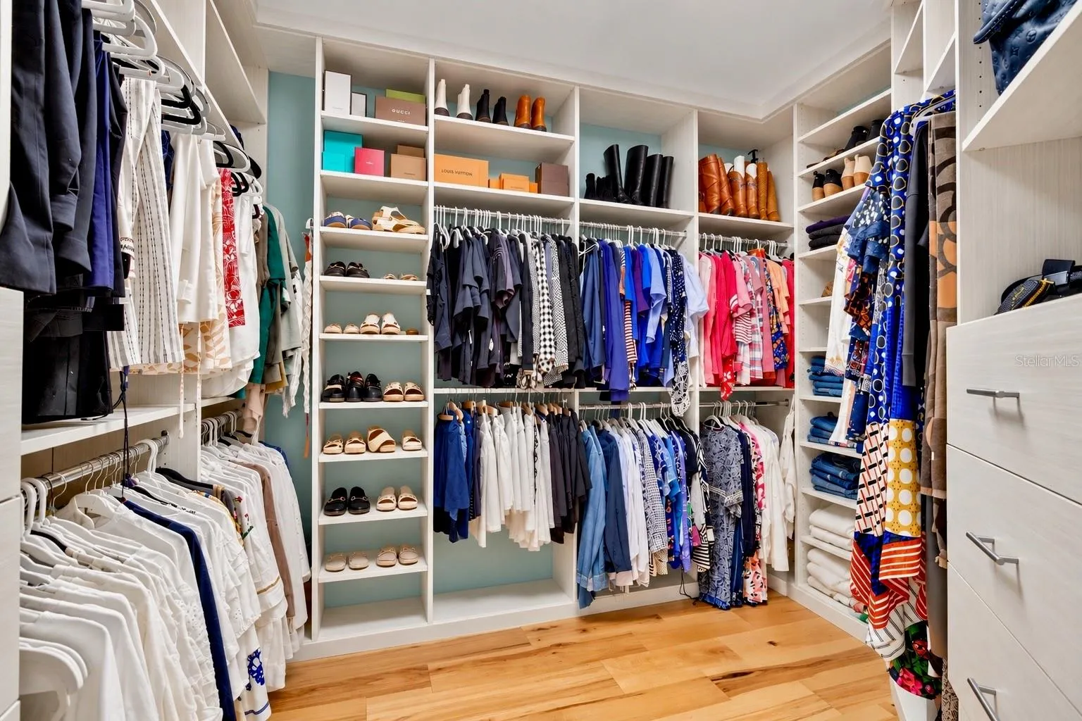 One of Two Primary Suite Walk-In Closets