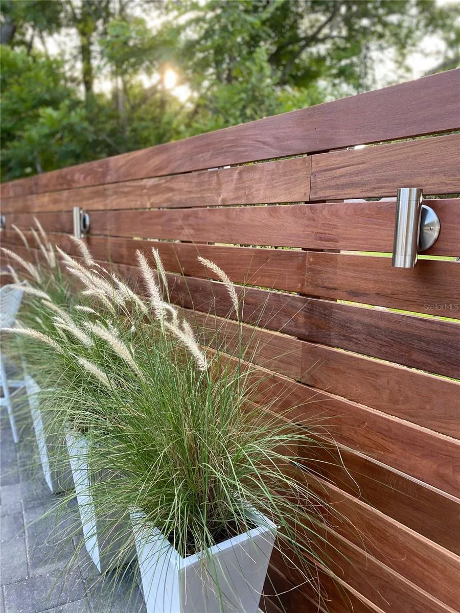 Beautifully Crafted Ipe Privacy Screen with Accent Lighting
