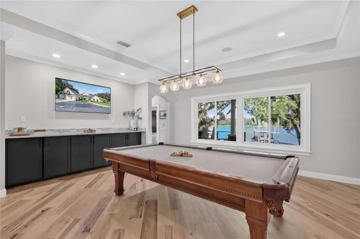 Billards Room with Buffet and Storage Cabinetry