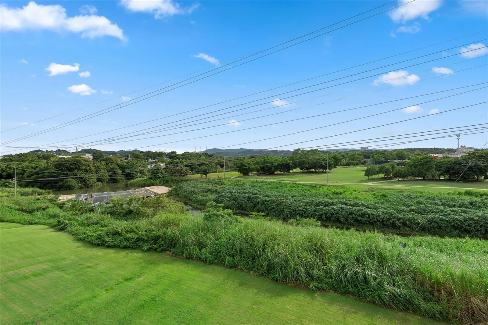 View to the river and golf course from terrace