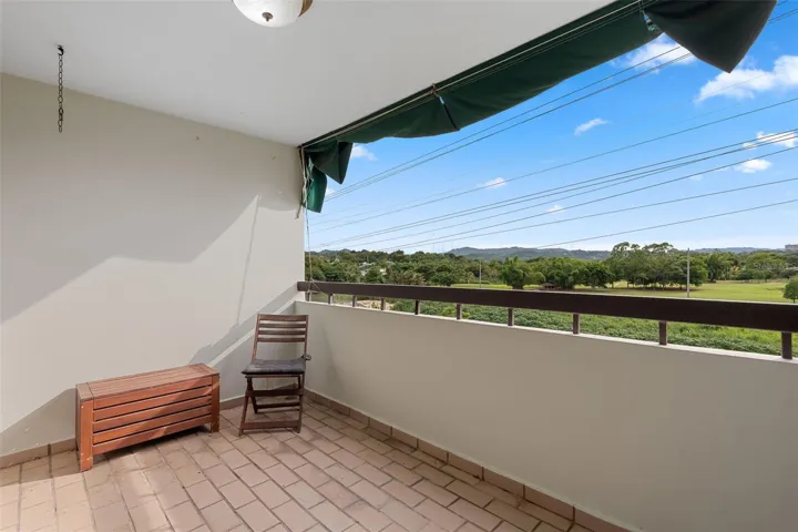 Balcony with view to the river and golf course